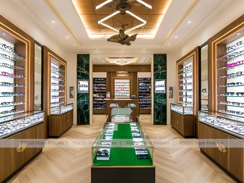 Gold Accent Optical Gallery Interior with Emerald Demo Island