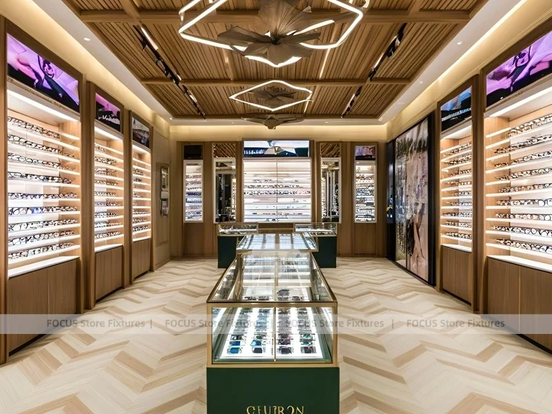 Gold Accent Optical Gallery Interior with Emerald Demo Island