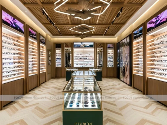 Gold Accent Optical Gallery Interior with Emerald Demo Island