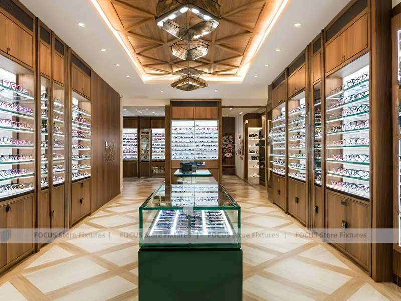 Gold Accent Optical Gallery Interior with Emerald Demo Island