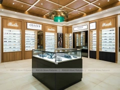 Gold Accent Optical Gallery Interior with Square Glass Counter