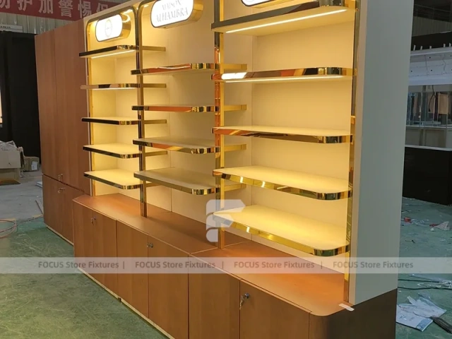 Gold Perfume Display Wall With Base Cabinets