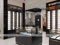 Graphite Copper Eyewear Retail Interior with Elevated Glass Islands