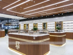 Linear Walnut Vision Boutique System with Multi-Island Merchandising