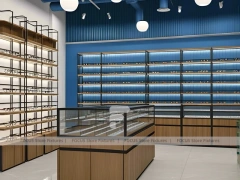 Midnight Eyewear Display Wall with Blue Brand Backdrop