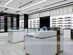 Refined White Optical Wall Display with Open Consultation Zone