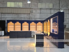Royal Blue Arched Perfume Display Wall