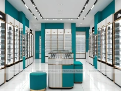 Teal Accent Optical Retail Interior with Rounded Ottoman Seating