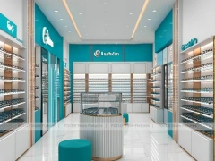 Teal Accent Optical Retail Interior with Rounded Ottoman Seating