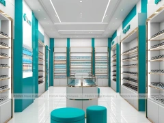 Teal Accent Optical Retail Interior with Rounded Ottoman Seating