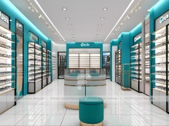 Teal Accent Optical Retail Interior with Rounded Ottoman Seating