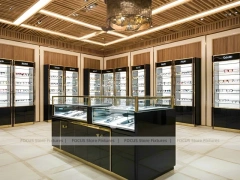 Warm Oak Eyewear Showcase Room with Boutique Centerpiece Counter