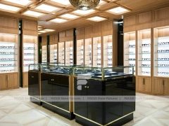 Warm Oak Vision Boutique Corridor with Boutique Centerpiece Counter