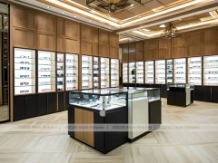 Warm Oak Vision Boutique Corridor with Boutique Centerpiece Counter