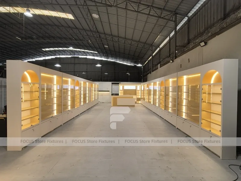 Warm White Perfume Aisle With Arch Shelving