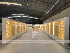 Warm White Perfume Aisle With Arch Shelving