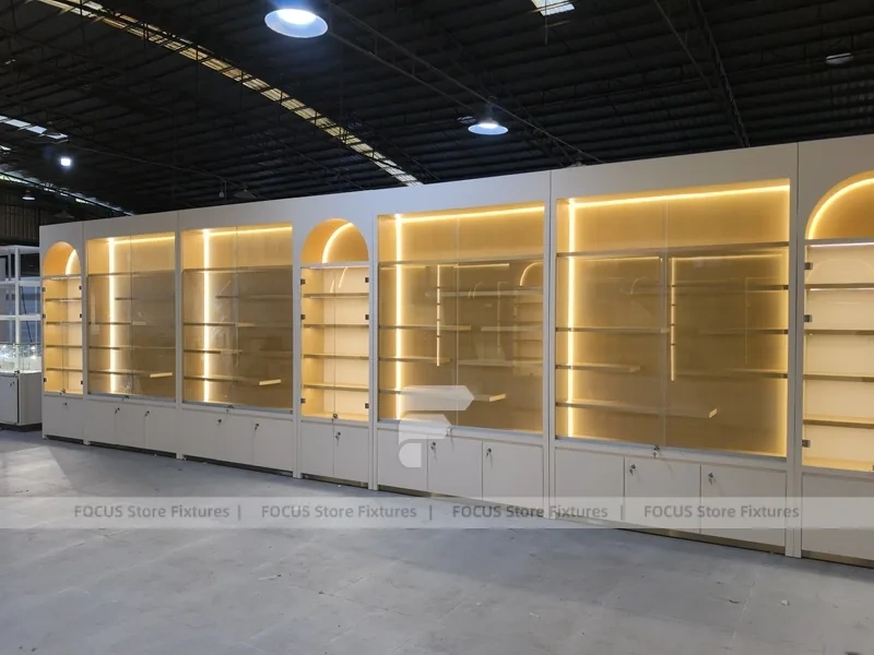 Warm White Perfume Aisle With Arch Shelving