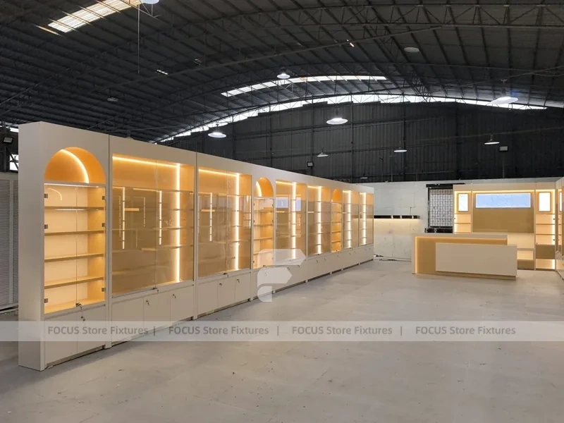 Warm White Perfume Aisle With Arch Shelving