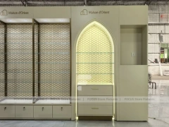 White Perfume Corner Layout With Arch Doorway