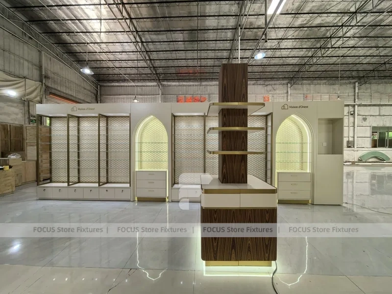 White Perfume Corner Layout With Arch Doorway