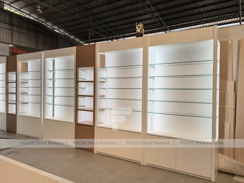 White Perfume Perimeter Wall Display With Round Tester Tables