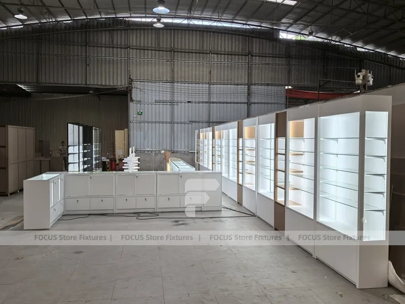 White Perfume Showroom Layout With Corner Shelving