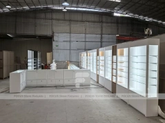 White Perfume Showroom Layout With Corner Shelving