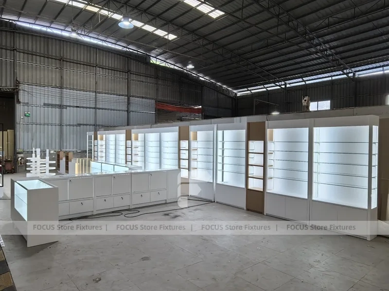 White Perfume Showroom Layout With Corner Shelving