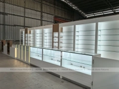 White Perfume Showroom Layout With Corner Shelving