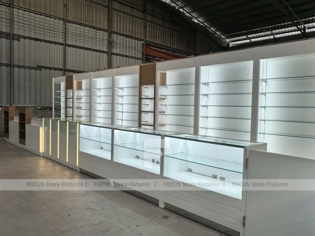 White Perfume Showroom Layout With Corner Shelving