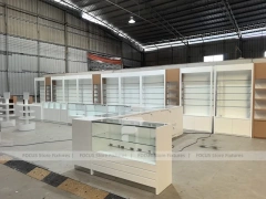 White Perfume Showroom Layout With Corner Shelving