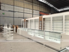 White Perfume Showroom Layout With Corner Shelving