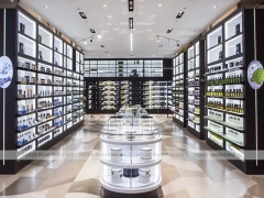 White Perfume Wall Gallery With Slim Black Frames