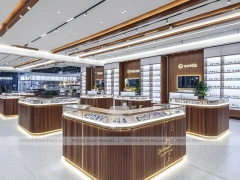 Woodgrain Optical Flagship Display with Multi-Island Merchandising