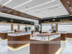 Woodgrain Optical Flagship Display with Multi-Island Merchandising