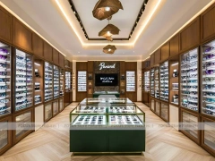 Woodgrain Optical Gallery Interior with Boutique Centerpiece Counter