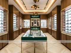Woodgrain Optical Gallery Interior with Layered Wall Shelving