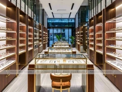 Amber Corridor Eyewear Boutique Hall with Slim Center Display Tables