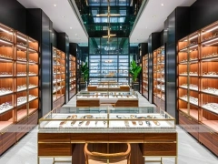 Amber Corridor Eyewear Boutique Hall with Slim Center Display Tables