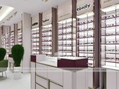 Aubergine White Vision Retail Interior with White Glass Island