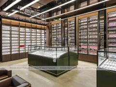 Black Frame Loft Eyewear Urban Showroom with Green Lit Display Bench