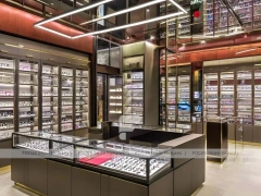 Black Frame Loft Eyewear Urban Showroom with Green Lit Display Bench