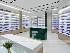 Black Frame Loft Optical Loft Gallery with Green Lit Display Bench