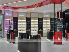 Blush Accent Optical Concept Store with Curved Red Portal