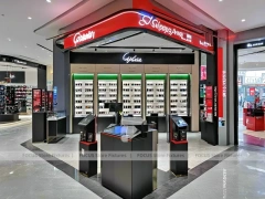 Blush Accent Optical Concept Store with Curved Red Portal