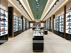 Blush Accent Optical Display Corridor with Double-Sided Display Tables