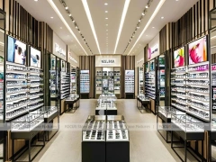 Blush Accent Optical Display Corridor with Double-Sided Display Tables