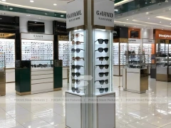 Blush Accent Optical Mall Display with Mirror-Lined Walkway