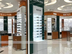 Blush Accent Optical Mall Display with Mirror-Lined Walkway