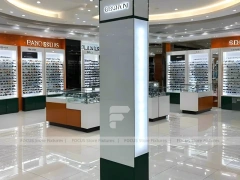 Blush Accent Optical Mall Display with Mirror-Lined Walkway